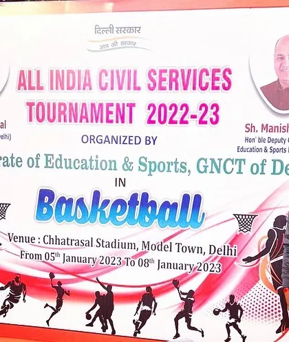 At the banner for the All India Civil Services Tournament. I am proud to contribute my expertise as an official for events organized by the Directorate of Education & Sports.