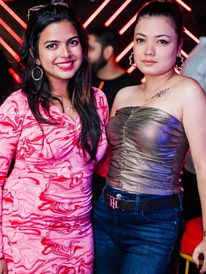 Two friends posing for a photo.