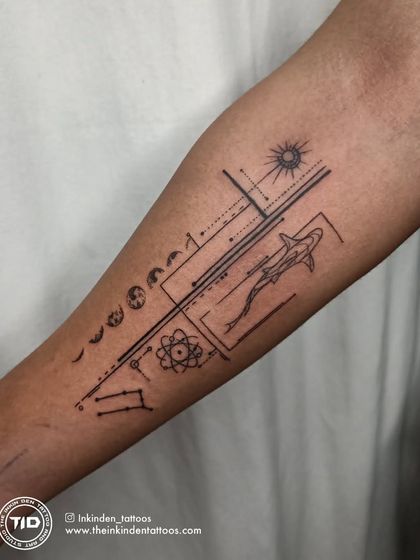 An abstract geometric tattoo that combines celestial elements like the sun and moon phases with scientific symbols. This custom piece is a visual representation of the client's interests in science and the cosmos.