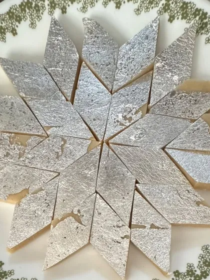 Our homemade Kaju Katli is a timeless classic, loved by everyone. Each piece is made with premium cashews and has the perfect melt in your mouth texture, topped with silver varq.