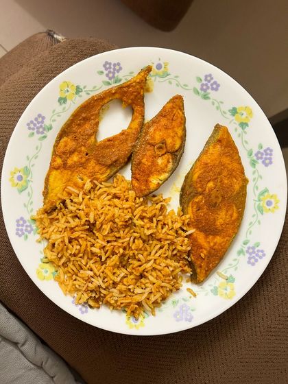 Another look at the tasty dinner of tomato rice and pan-fried fish.