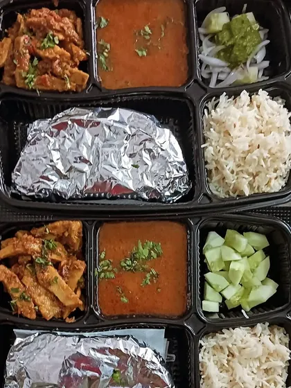 A customized thali with chana masala and arbi sabzi. I love creating these unique combinations based on customer requests.