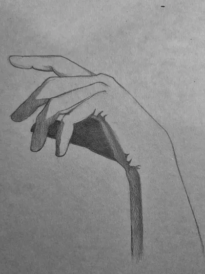The blocking-in stage of the hand study, where the main shadow shapes are established.