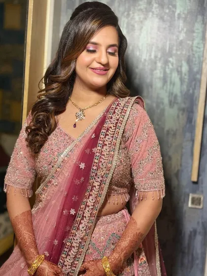The first of three looks for this bride: a soft pink engagement look to complement her radiant glow and elegant outfit.