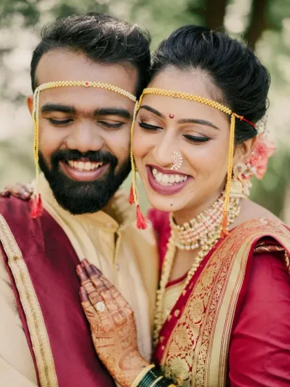 A happy couple portrait that captures their joy and connection. Her makeup is flawless and complements his look perfectly.