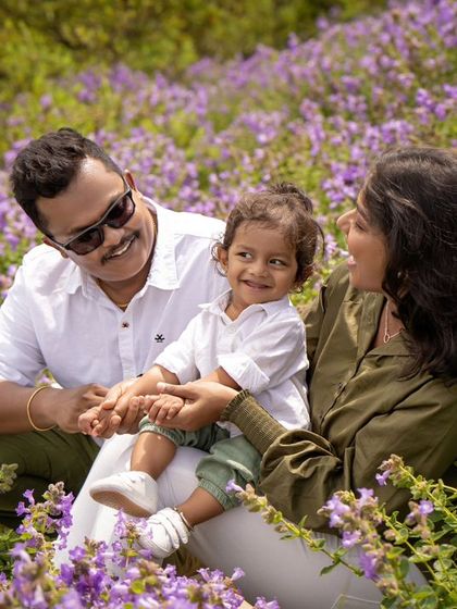 Another shot from the magical Neelakurinji flower fields. This family's joy is as vibrant as the flowers around them.