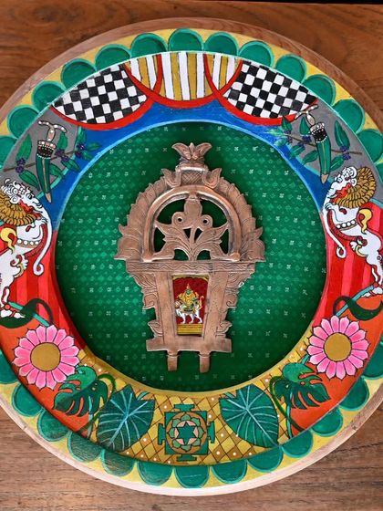 The finished Buddha (Mercury) frame, a hand-painted piece celebrating the purveyor of youth and wisdom. The artwork features his mount, a mythical lion-elephant creature, and a lush green palette representing his connection to the natural world.