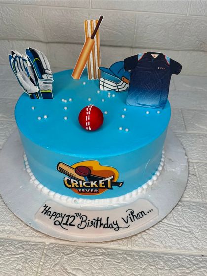 This cricket-themed cake is a hit for any cricket fan. It's decorated with a bat, ball, wickets, and gloves, celebrating a 12th birthday with a passion for the sport.