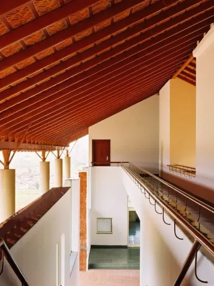 In response to Goa's heavy monsoons, I designed this office under a single, large canopy-like roof. The deep verandahs and use of local laterite stone are examples of my climate-responsive approach, ensuring the building belongs to its place.