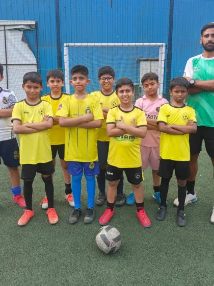 A group photo of one of our weekend batches with their coach. We provide a structured and fun environment for players of all levels.