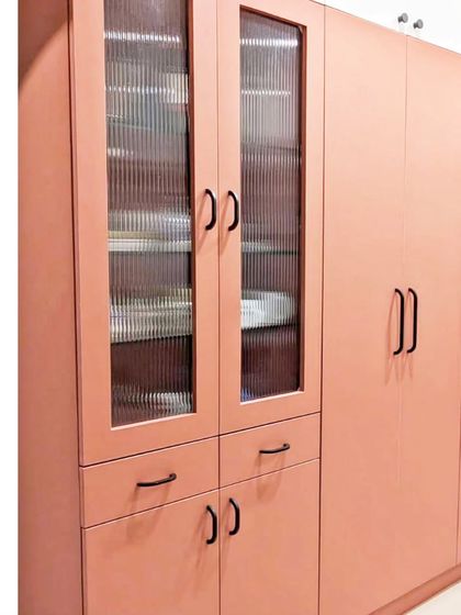 A preview of the 'Colour Crush Bachelorette Pad,' featuring a pretty pink kitchen with fluted glass cabinets. This project embraces a bold, playful, and modern aesthetic.