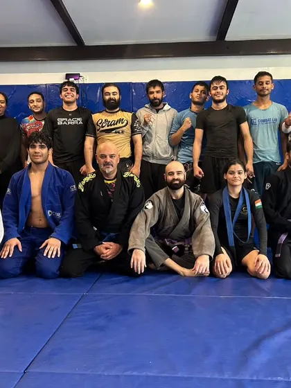 A group photo after the final open mat of the year. It's great to see our team alongside members of the Warrior's Cove team, showing the spirit of the wider Jiu-Jitsu community.