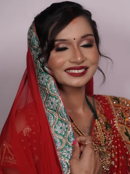 A serene moment captured, with eyes closed to show the soft, blended eyeshadow work. The look is traditional yet feels light and comfortable.