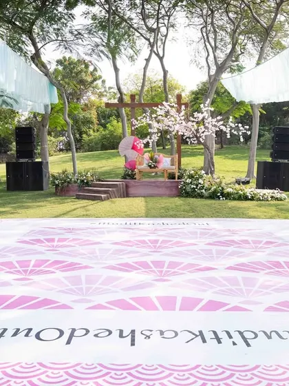 The custom-printed dance floor from our 'Whispers of the Orient' carnival, featuring a fan-inspired pattern that tied the whole theme together.