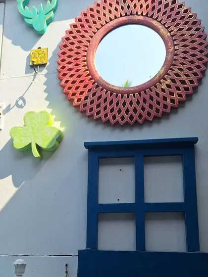The quirky and colorful decor on the walls of Purple Martini, reflecting the vibrant spirit of Goa.