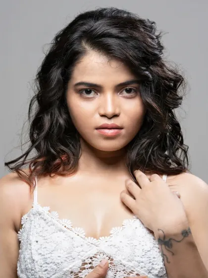 A simple and beautiful beauty portrait. This showcases a natural, fresh-faced look with soft, textured hair, focusing on the model's features.