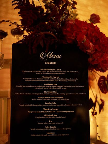 The cocktail menu for "The Secret Waltz" speakeasy, featuring classic and custom drinks with creative names.