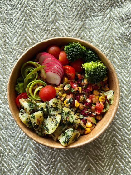 Announcing our Aamchi Mumbai Chaat Salad Bowl. This bowl is nostalgia, combining herbed potatoes, sprouts, smoked corn, and kachi keri (raw mango) with a sweet and tangy parsley cilantro dressing.