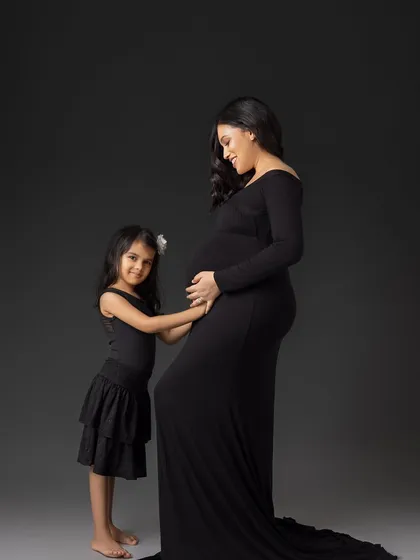 A duplicate of ID 242, this classic pose is a beautiful way to show the bond between mother and child.