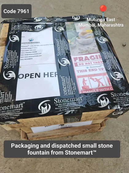 This image confirms the packaging and dispatch of a small stone fountain from our workshop.
