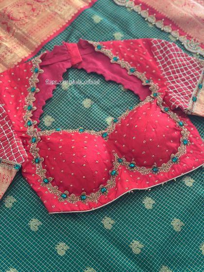 The front of the red checkered sleeve blouse.