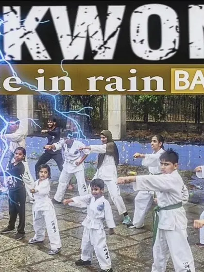 A promotional image for our YouTube channel, showing our students training with dedication even in the rain.
