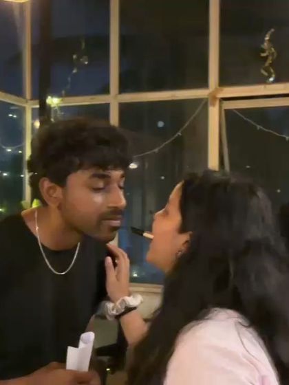 A playful moment between two attendees. It's all about having fun and being yourself.