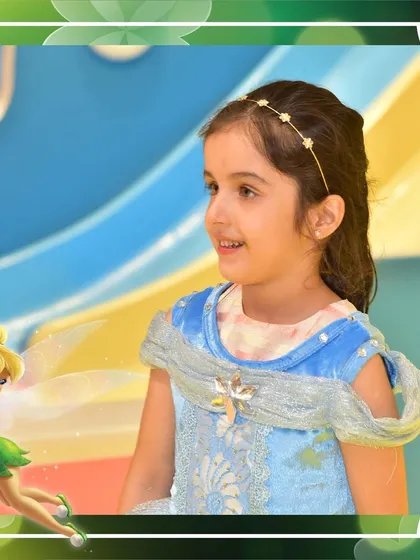 Every detail counts in a themed party. For this Tinkerbell celebration, the birthday girl dressed as her favorite fairy, adding to the magical atmosphere of the day.