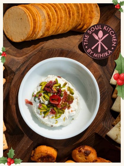 Our Cranberry Pistachio Cheese spread is dressed in Santa's favourite hues of red, green, and white. It's a festive and delicious addition to any Christmas grazing board.