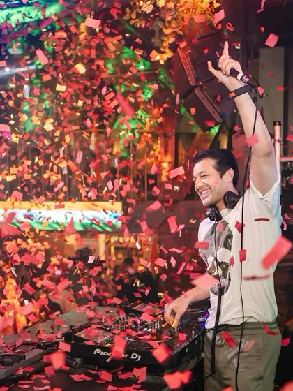 Nothing beats the feeling of a packed club, confetti in the air, and the entire crowd singing along. This shot from a 'Thursday Night Madness' event at Happy Brew captures the peak energy I bring to my club and pub gigs.