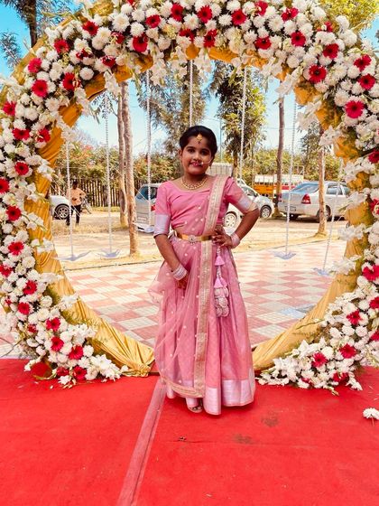 Little Litanya looking precious in her custom pink half saree. I designed this outfit for a wedding event, ensuring it was both beautiful and comfortable for her to wear.