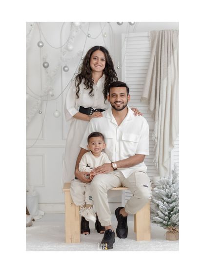 A classic, full-length family portrait in our "White Christmas" wonderland.