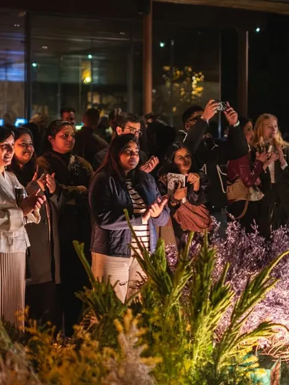 The audience is captivated by a performance during the Soho House event. This image shows our venue's ability to host live performances and cultural gatherings.