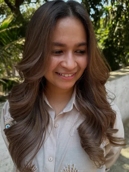 This is what a 'Beige Color Refresh' looks like. We took her faded, brassy hair and transformed it into this soft, beautiful beige blonde with a healthy shine.
