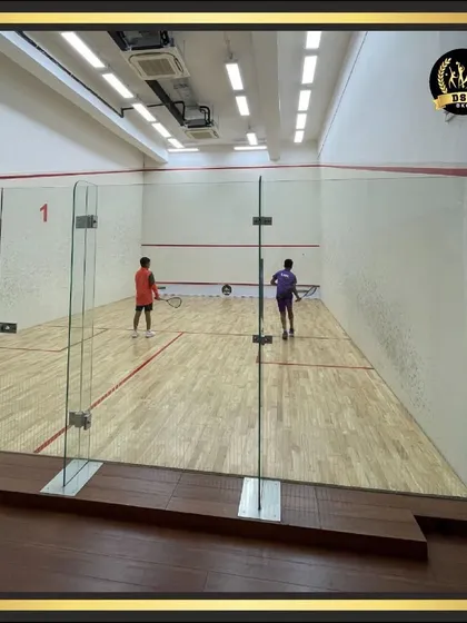 A clear view of one of our professional-grade, glass-backed squash courts. These are built to international standards, perfect for both intense competition and a friendly practice session.