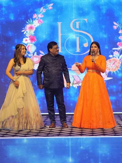 On stage with the parents, sharing a story. I work to make family members feel comfortable and cherished during the event.
