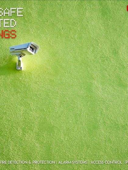 Even on unconventional surfaces, we ensure optimal camera placement. This camera is mounted on a textured green wall, demonstrating our ability to adapt installations to unique building designs while maintaining effective surveillance.