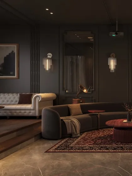 We designed this entertainment lounge for mood and intimacy. Wrapped in near-black walls and layered with deep red and wood tones, the space feels immersive and luxurious, perfect for movie nights or quiet conversations.