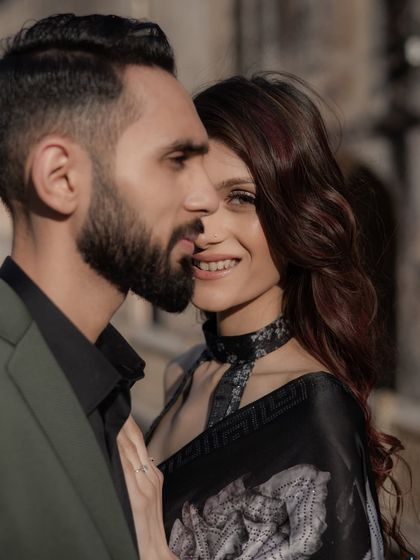 A close-up portrait that feels both elegant and authentic. The bride's glance towards the camera adds a touch of modern confidence to this classic, romantic setting.