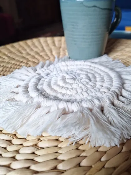Here's how the spiraled coaster looks with a mug of chai. It adds such a cozy, handmade feel to your break time.