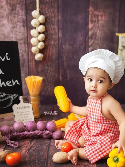 Exploring all the colourful ingredients in the kitchen. This theme is not just cute but also a great sensory experience for the baby, which leads to the most natural and happy photos.