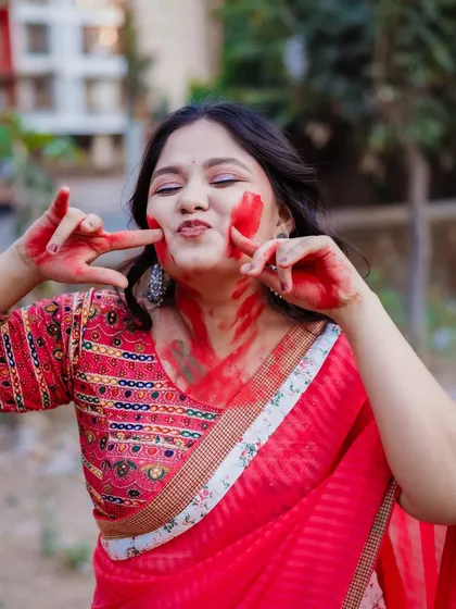 A fun and cheeky pose from the Holi shoot. This image captures the playful spirit of the festival perfectly.