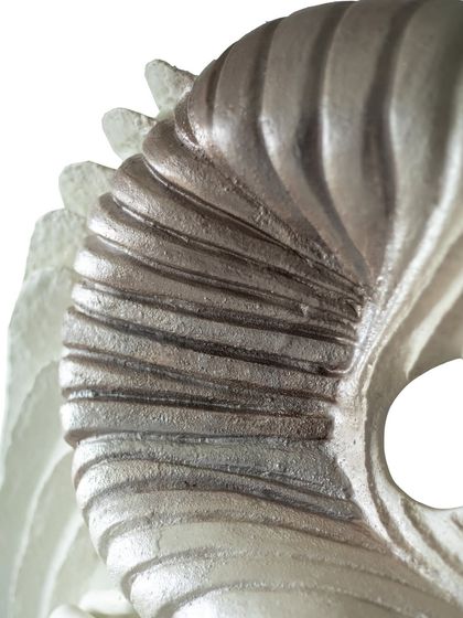 The transition from dark to light texture in "The Awakening Cycle" (Series 3) is created with layers of upcycled paper and mixed media, symbolizing the journey out of darkness.