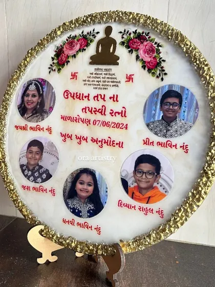 Another view of the large family frame for a religious event, showing the placement of the five photos and decorative elements.