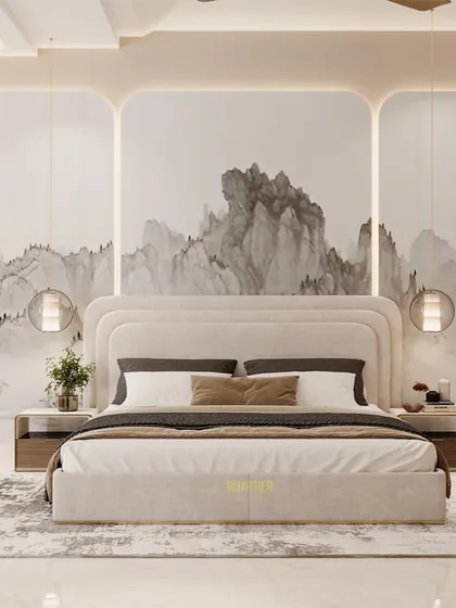 A guest bedroom design featuring a false wall with abstract wallpaper and cove lighting. The bed has a luxurious quilted, layered headboard, and the false ceiling also has a layered design.