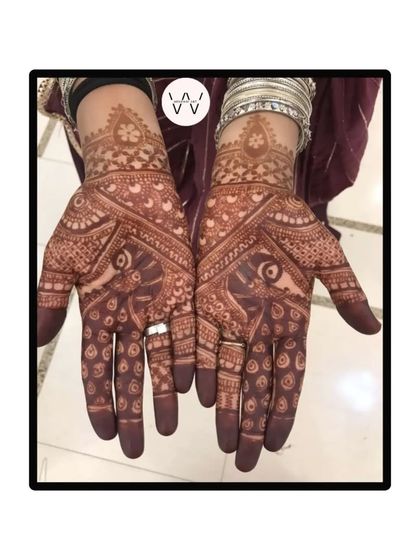 The rich, developed stain of the facing peacocks design.