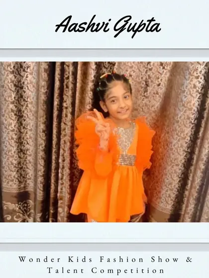 Congratulations and welcome, Aashvi Gupta. Her bright orange outfit and happy pose are infectious.
