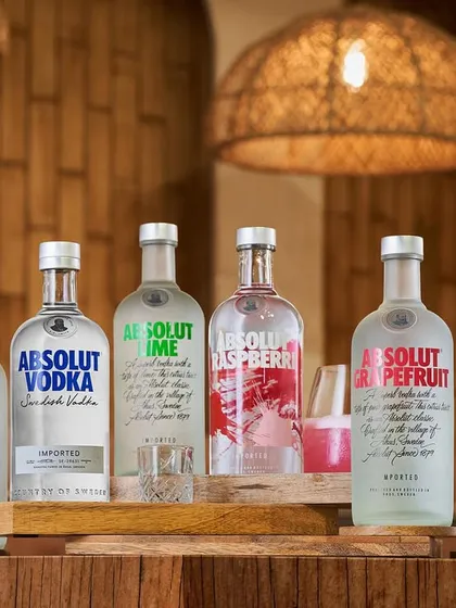 An Absolut delight. We shot the entire range of Absolut Vodka flavors through the night to get this perfect group shot. Each bottle is clearly lit, and the colorful cocktails hint at the possibilities within.