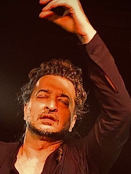 A live moment from an intimate 'Heart to Art' event. In these settings, I can truly connect with the audience and share the story behind my dance.