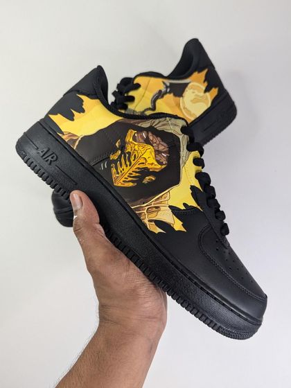 The completed Scorpion custom on a black Air Force 1. The yellow and orange really pop against the black base.